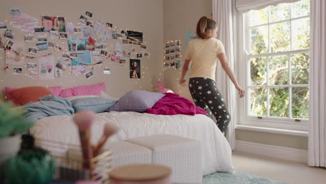 happy-teenage-girl-dancing-in-bedroom-having-fun-dance-celebrating-weekend-feeling-positive-wearing-pajamas-at-home