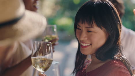 beautiful-asian-woman-dancing-with-friends-at-summer-dance-party-drinking-wine-making-toast-enjoying-summertime-social-gathering-having-fun-celebrating-on-sunny-day-4k-footage