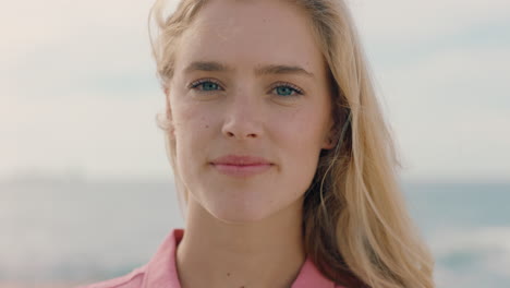 portrait-beautiful-blonde-woman-looking-confident-enjoying-summer-on-beach-happy-independent-female-by-the-sea-4k-footage