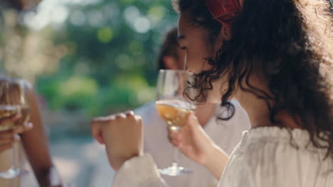 beautiful-woman-dancing-with-friends-at-summer-dance-party-drinking-wine-enjoying-summertime-social-gathering-having-fun-celebrating-on-sunny-day-4k-footage