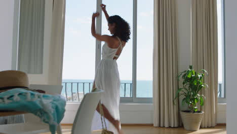 travel-woman-dancing-in-hotel-room-having-fun-celebrating-summer-vacation-enjoying-carefree-holiday-lifestyle