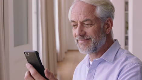 mature-man-having-video-chat-using-smartphone-waving-at-baby-smiling-enjoying-connection-grandfather-chatting-on-mobile-phone
