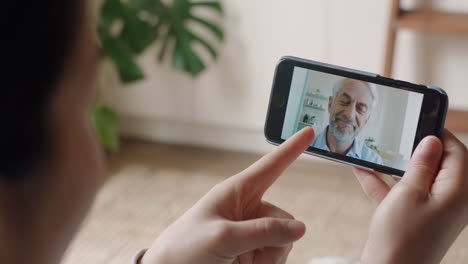 young-woman-using-smartphone-video-chatting-with-deaf-grandfather-communicating-using-sign-language-hand-gestures-enjoying-online-communication