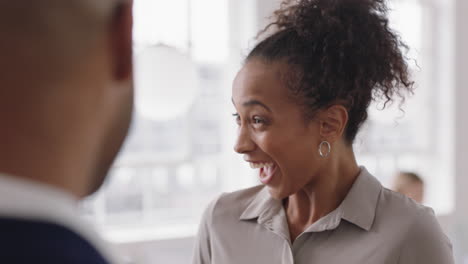 beautiful-mixed-race-business-woman-chatting-with-clients-smiling-enjoying-developing-corporate-partnership-discussing-project-in-modern-office-workspace