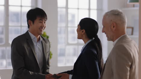 business-people-shaking-hands-young-asian-man-greeting-corporate-management-team-for-job-interview-enjoying-career-opportunity-in-office