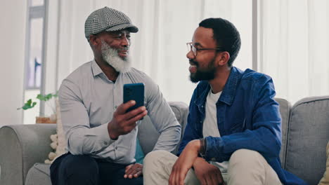 Home,-father-and-son-with-a-smartphone