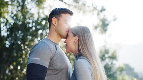 Fitness,-couple-and-kiss-in-forest-with-love