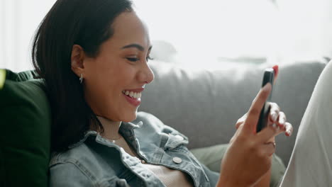 Woman,-phone-and-and-happy-text-in-home