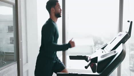 Man,-running-on-treadmill-and-fitness-in-gym