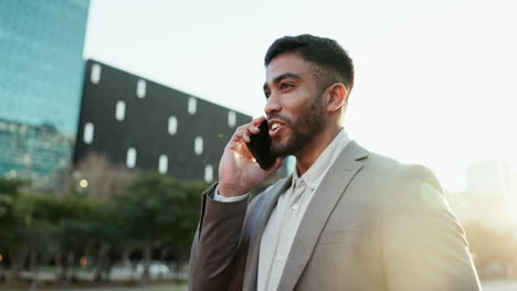 Phone-call,-walking-and-young-businessman