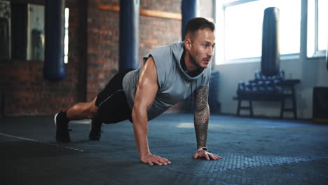 Fitness,-push-up-and-challenge-with-man-in-gym