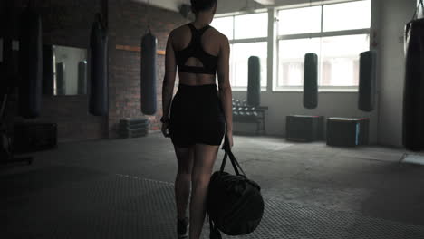 Gym,-walking-and-woman-with-a-bag-for-exercise