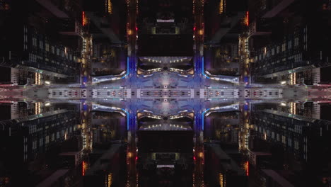 Birds-eye-shot-of-colourfully-lit-streets-of-metropolis-at-night.-Abstract-computer-effect-digital-composed-footage.