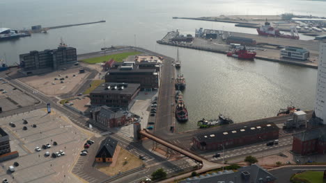 Aerial-view-of-Esbjerg-harbor,-one-of-the-largest-harbor-of-the-North-Sea.-This-harbor-is-the-primary-port-for-oil-and-gas-sector-and-leading-for-offshore-wind-in-Europe