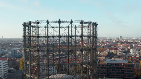 Famous-metal-structure-in-Berlin,-Germany-Gasometer-or-Gas-holder-in-Schoneberg,-Aerial-Wide-View