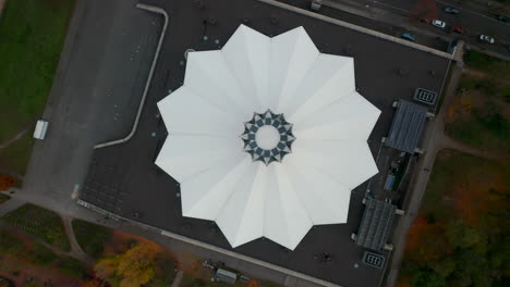Aerial-Birds-Eye-Overhead-Top-Down-View-of-Tempodrom-Futuristic-Modern-Event-Space-Building,-Top-View-in-Berlin,-Germany
