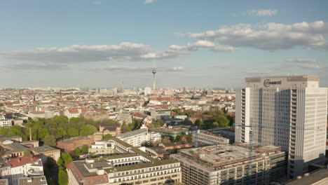 AERIAL:-Passing-by-Charite-Hospital-Building-in-Berlin,-Germany-in-times-of-COVID-19-Coronavirus