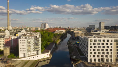 AERIAL:-Beautiful-Drone-Hyper-Lapse,-Motion-Time-Lapse-over-Berlin-River-in-European-City-with-Cloudy-Blue-Sky