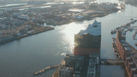 Aerial-view-of-modern-rooftop-of-Elbphilharmonie-music-hall-building-on-the-river-bank-of-Elbe-river-in-Hamburg,-Germany