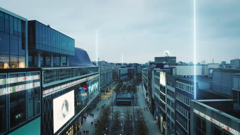 Forwards-fly-above-Zeil-shopping-street-at-twilight.-Using-digital-visual-effects.-Frankfurt-am-Main,-Germany