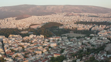 Aerial-View-of-The-Temple-of-Olympian-Zeus-in-Athens,-Greece-during-Golden-Hour-Sunset-light