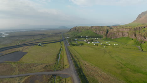 Aerial-view-icelandic-highlands-with-mossy-green-cliffs.-Drone-view-of-grassland-countryside-near-Seljalandsfoss-in-Iceland.-Beauty-on-earth