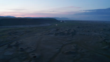 Drone-view-of-amazing-moonscape-Iceland-countryside.-Birds-eye-of-icelandic-highlands-of-desolate-icelandic-green-highlands.-Solitude,-loneliness
