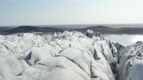 Birds-eye-view-over-Breidamerkurjokull-glacier-near-Skaftafell-on-south-Iceland.-Aerial-view-of--Breidamerkurjokull-icelandic-glacier-tongue.-Beauty-on-earth.-Vatnajokull-national-park