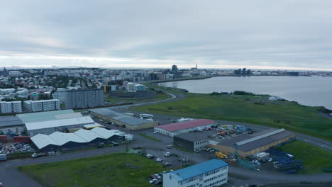 Aerial-view-of-commercial-street-and-neighborhood-of-Reykjavik,-Iceland-capital-city.-Travel-destination.-Wanderlust.-Birds-eye-top-view-of-the-colorful-rooftop-and-the-urban-panorama