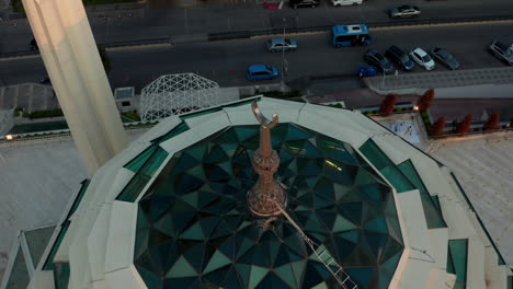 Close-up-of-Crescent-Moon-on-Top-of-Mosque-as-Sign-in-Islam-Muslim-prayers,-Aerial-Drone-View