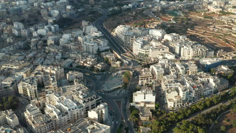 Roundabout-in-Malta-City-with-Car-traffic-on-Sunny-Day-from-Aerial-Wide-View-perspective