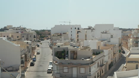 Empty-Ghost-Town,-Small-mediterranean-City-on-Malta-Island,-No-People-during-Coronavirus-Covid-19-Pandemic-and-Lockdown,-Aerial-View
