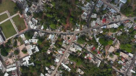 Aerial-birds-eye-overhead-top-down-view-of-town.-Mixture-of-trees,-greenery-and-development.-Valladolid,-Mexico