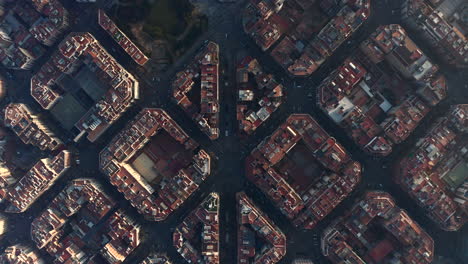Birds-eye-shot-of-square-blocks-of-buildings-in-urban-borough.-Avinguda-Gaudi-passing-through-middle-of-shot.-Barcelona,-Spain