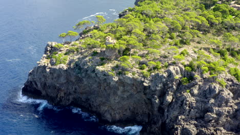 AERIAL:-Over-Beautiful-Coast-Line-of-Tropical-Island-Mallorca,-Spain-with-ocean-and-Blue-water-in-Summer,Daylight-Vacation,-Travel,-Sunny,-Waves