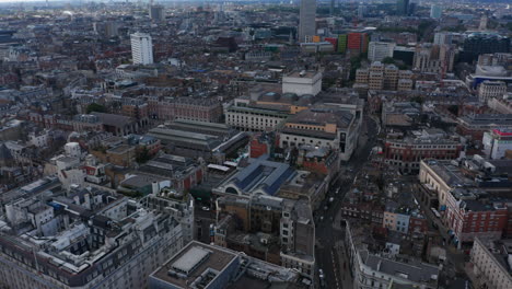 Panorama-curve-footage-of-urban-neighbourhood.-Aerial-view-of-Royal-Opera-House-in-Covent-Garden-district.-London,-UK