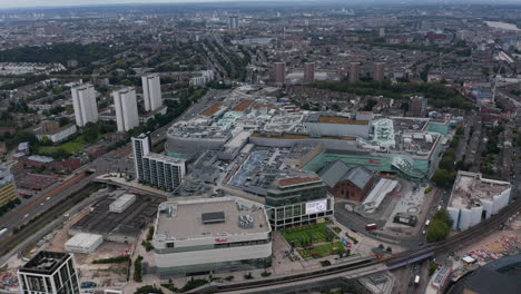 Group-of-modern-buildings.-Aerial-footage-of-shopping-and-entertaining-centre.-Wide-panoramic-shot.-London,-UK