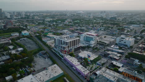 Aerial-panoramic-view-of-buildings-in-urban-neighbourhood.-Wynwood-town-borough-at-twilight.-Miami,-USA