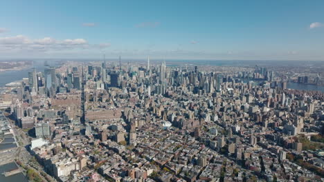 Aerial-panoramic-footage-of-city.-Tall-office-downtown-skyscrapers-in-midtown.-Manhattan,-New-York-City,-USA