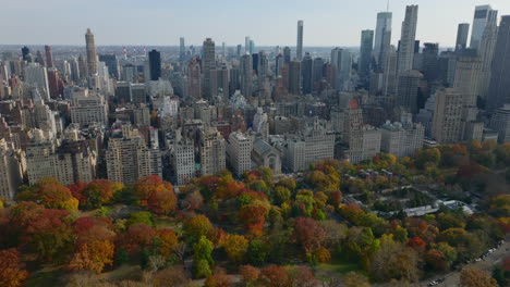 High-angle-footage-of-high-rise-buildings-around-autumn-Central-park.-Manhattan,-New-York-City,-USA