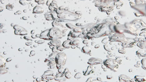 Cherry-tomatoes-splashing-liquid-closeup.-Fresh-garden-vegetables-drop-bubbling