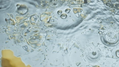 Yellow-banana-falling-water-closeup.-Delicious-tropical-fruit-splashing-smooth