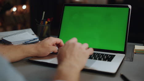 Hands-greeting-chromakey-computer-at-home-office-closeup.-Manager-videocalling