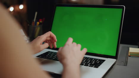 Woman-arms-texting-chromakey-computer-home-closeup.-Unknown-girl-pushing-buttons