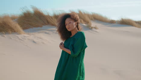 Girl-performer-dancing-sand-desert-summer-day.-Woman-dancer-moving-sensually.