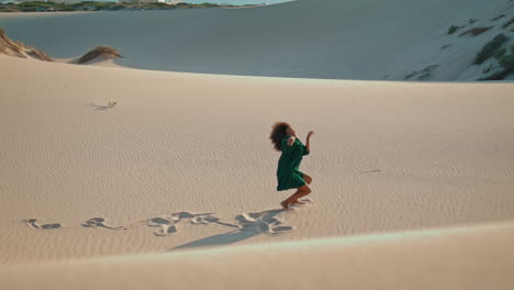 Woman-actor-dancing-sand-dunes-summer-haze.-Emotional-girl-performing-dance.