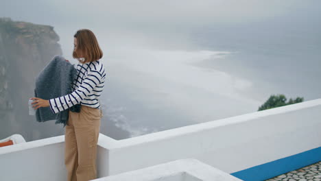 Girl-resting-sea-town-rooftop-on-summer-holidays.-Stunning-mediterranean-coast.