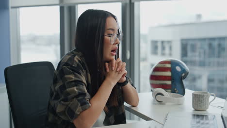 Nervous-businesswoman-gesturing-computer-call-at-home.-Stressed-woman-rejecting