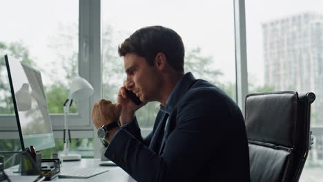 Smiling-manager-calling-partner-enjoying-conversation-closeup.-Happy-ceo-working