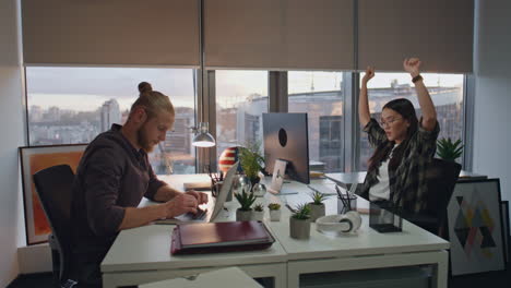 Exhausted-woman-stretching-body-at-sunset-office-close-up.-People-working-late